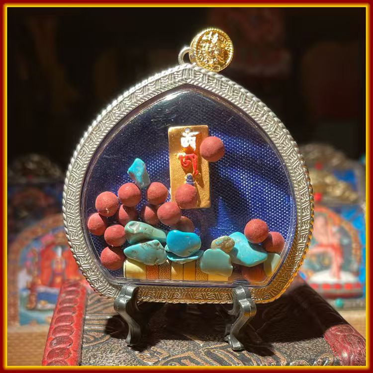 This is a Buddhist amulet made of clay by artisans on the roof of the world. It was fired at high temperatures and then hand-painted with mineral pigments. Its name is Padmasambhava.
