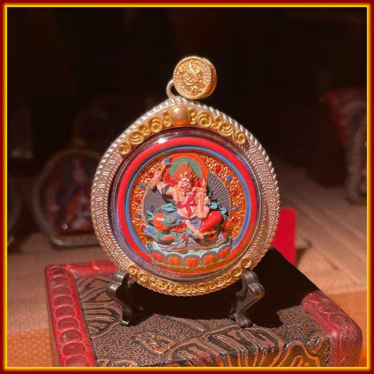 These are amulets made of clay by artisans on the roof of the world, fired at high temperatures, and then hand-painted with mineral pigments. His name is White Jambhala.