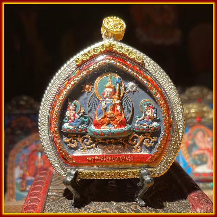 This is a Buddhist amulet made of clay by artisans on the roof of the world. It was fired at high temperatures and then hand-painted with mineral pigments. Its name is Padmasambhava.