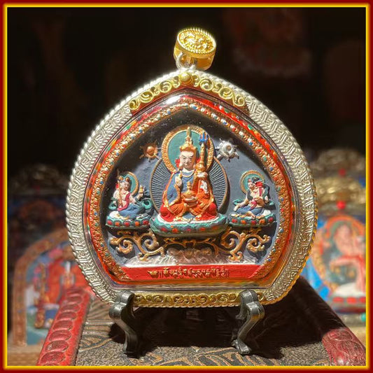 This is a Buddhist amulet made of clay by artisans on the roof of the world. It was fired at high temperatures and then hand-painted with mineral pigments. Its name is Padmasambhava.