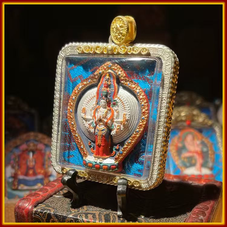 This is a Buddhist amulet made of clay by artisans on the roof of the world, fired at high temperatures, and then hand-painted with mineral pigments. Its name is Thousand-Armed Guanyin.