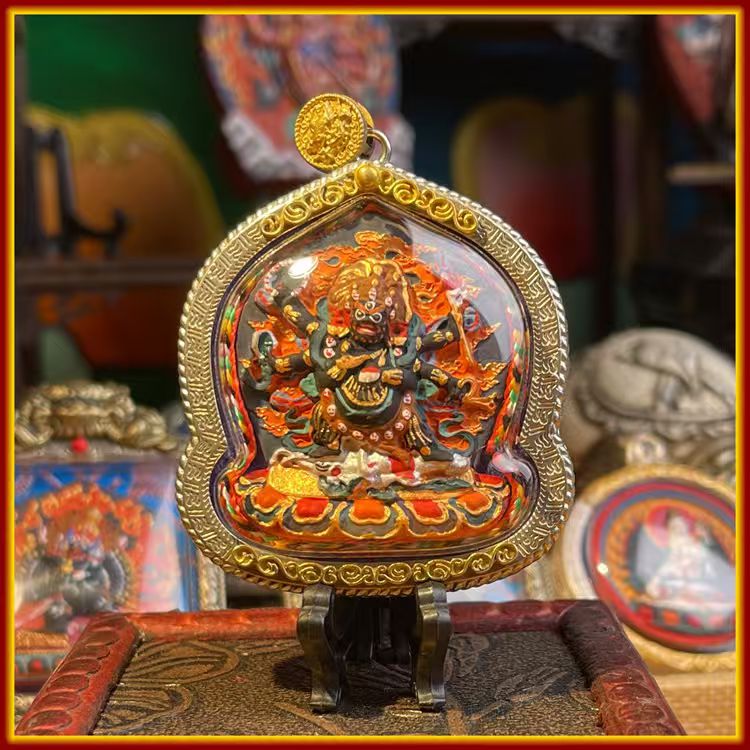 This is a Buddha amulet made of clay by artisans on the roof of the world. It was fired at high temperatures and then hand-painted with mineral pigments. Its name is Six-Armed Mahakala.