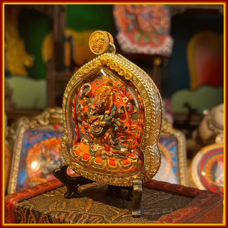 This is a Buddha amulet made of clay by artisans on the roof of the world. It was fired at high temperatures and then hand-painted with mineral pigments. Its name is Six-Armed Mahakala.