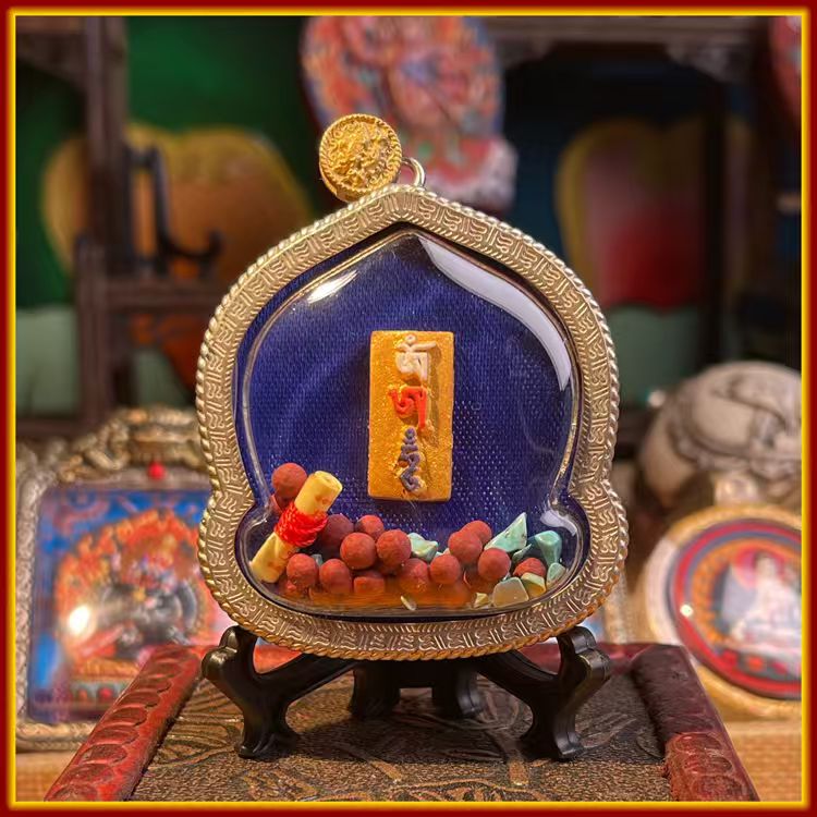 This is a Buddha amulet made of clay by artisans on the roof of the world. It was fired at high temperatures and then hand-painted with mineral pigments. Its name is Six-Armed Mahakala.