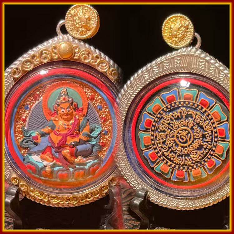 This is a Buddha amulet made of clay by artisans on the roof of the world, fired at high temperatures, and hand-painted with mineral pigments. Its name is Yellow Jambhala.