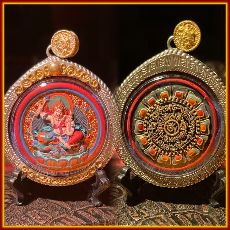These are amulets made of clay by artisans on the roof of the world, fired at high temperatures, and then hand-painted with mineral pigments. His name is White Jambhala.