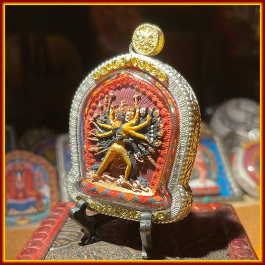 These are amulets made of clay by artisans on the roof of the world, fired at high temperatures, and hand-painted with mineral pigments. They are called Kalachakra amulets.