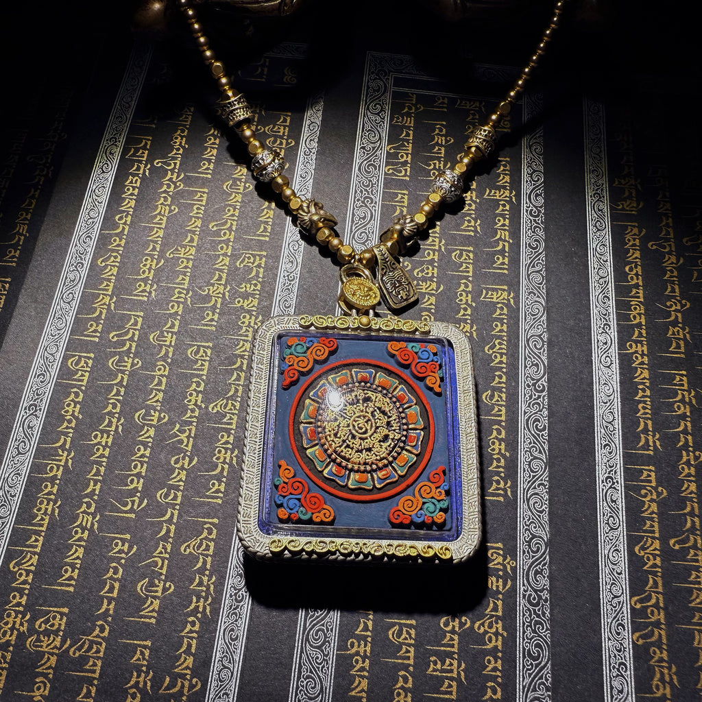 Tibetan amulet – handmade. Dzi bead necklace, bracelet, thangka, and ritual implements – this amulet is handcrafted by Tibetan artisans and meticulously painted with natural mineral pigments. No two are exactly alike.
