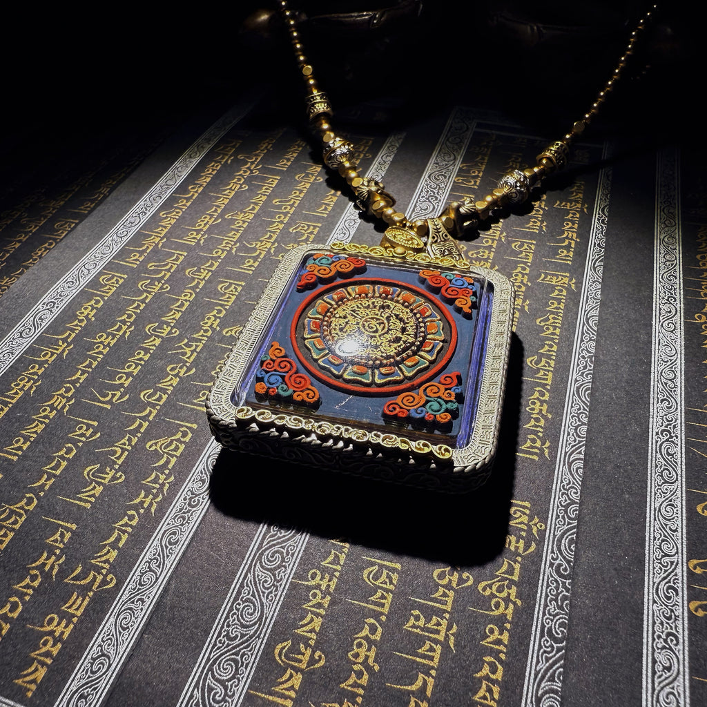 Tibetan amulet – handmade. Dzi bead necklace, bracelet, thangka, and ritual implements – this amulet is handcrafted by Tibetan artisans and meticulously painted with natural mineral pigments. No two are exactly alike.