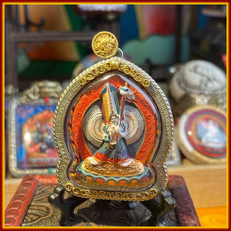 This is a Buddha amulet made of clay by artisans on the roof of the world, fired at high temperatures, and then hand-painted with mineral pigments. Its name is the Mahaprajapati Buddha Mother Image.
