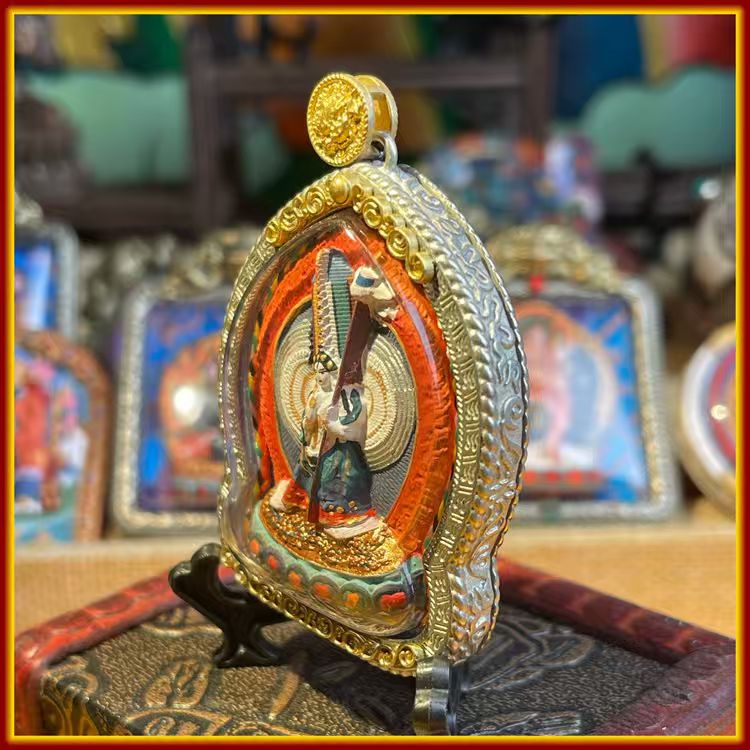This is a Buddha amulet made of clay by artisans on the roof of the world, fired at high temperatures, and then hand-painted with mineral pigments. Its name is the Mahaprajapati Buddha Mother Image.