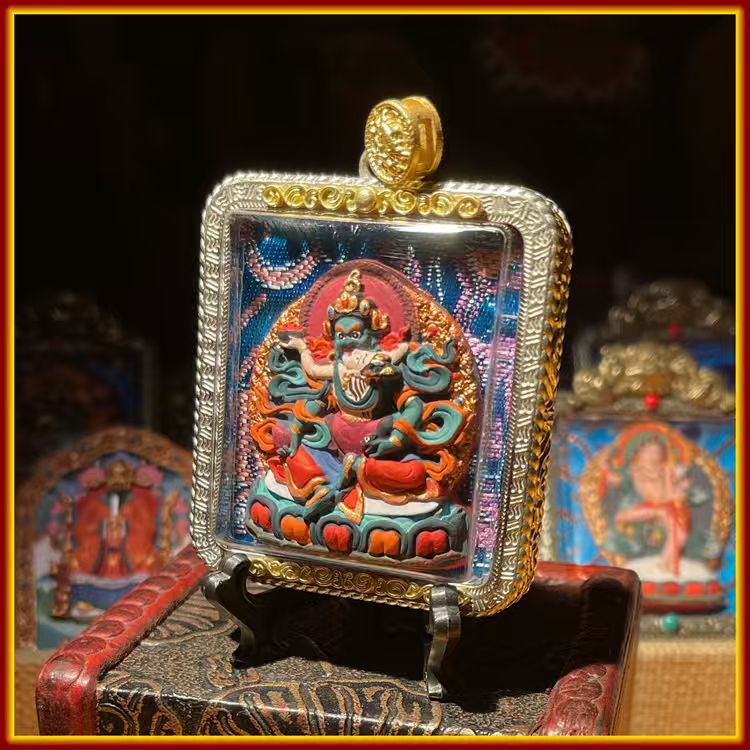 This is a Buddha amulet made of clay by artisans on the roof of the world, fired at high temperatures, and hand-painted with mineral pigments. Its name is Green Tara.