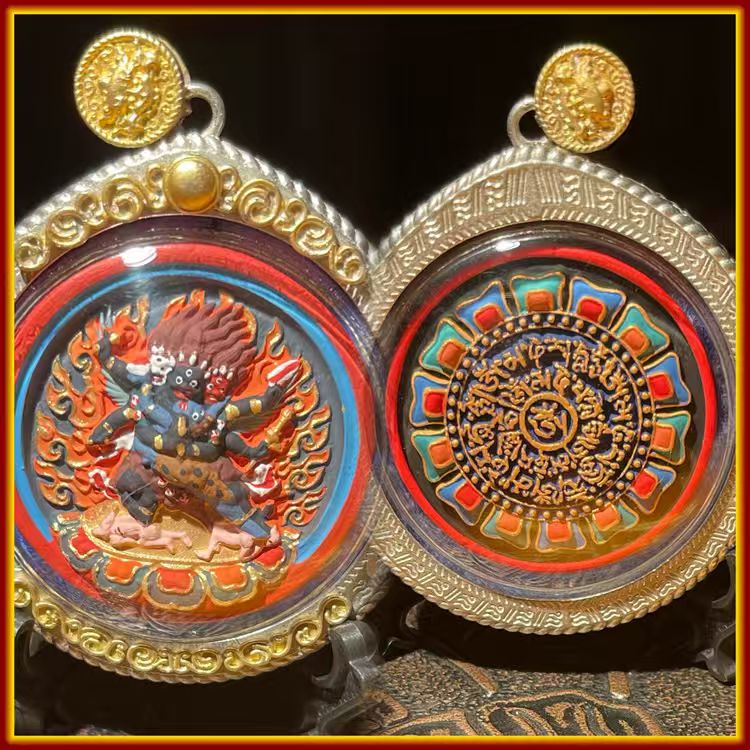 This is a Buddhist amulet made of clay by artisans on the roof of the world, fired at high temperatures, and hand-painted with mineral pigments. Its name is Vajrakilaya.