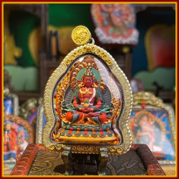 These are Buddha amulets made of clay by artisans on the roof of the world, fired at high temperatures and hand-painted with mineral pigments. His name is Amitayus (Buddha of Longevity).