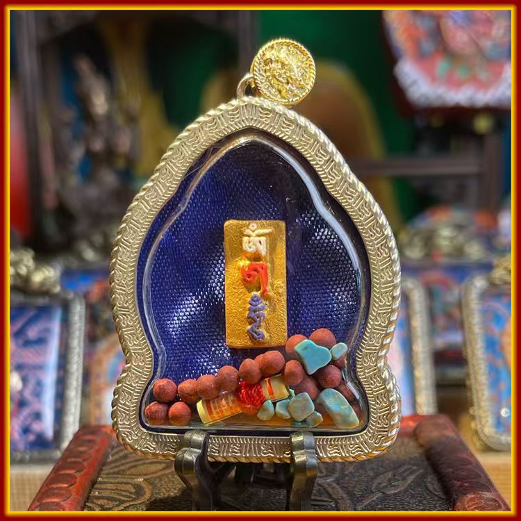 These are Buddha amulets made of clay by artisans on the roof of the world, fired at high temperatures and hand-painted with mineral pigments. His name is Amitayus (Buddha of Longevity).