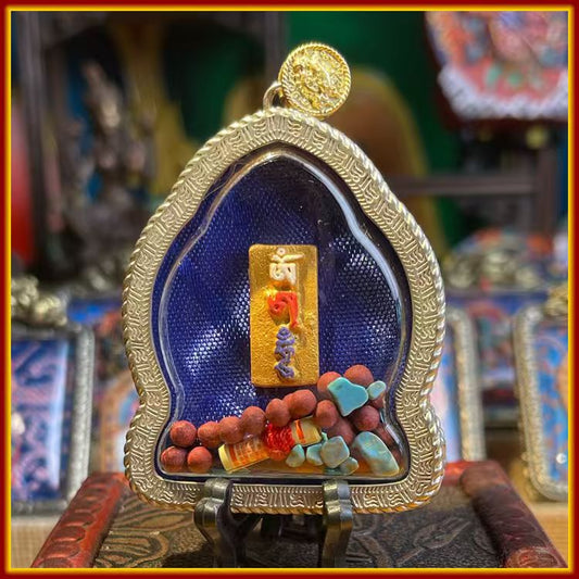 These are Buddha amulets made of clay by artisans on the roof of the world, fired at high temperatures and hand-painted with mineral pigments. His name is Amitayus (Buddha of Longevity).
