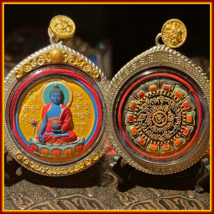 These are Buddha amulets made of clay by artisans on the roof of the world. They are fired at high temperatures and then hand-painted with mineral pigments. They are called Medicine Buddhas.