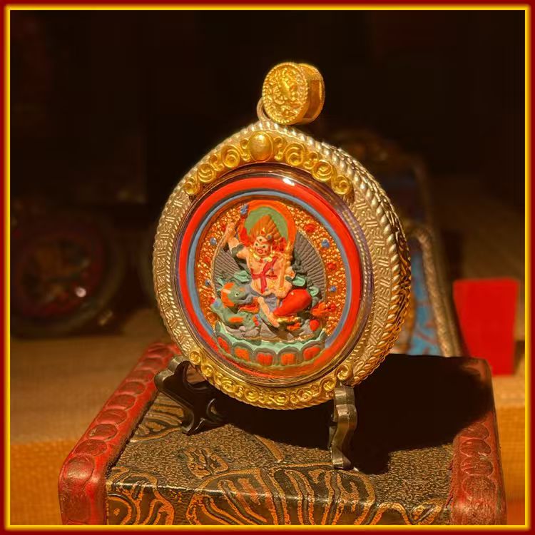 These are amulets made of clay by artisans on the roof of the world, fired at high temperatures, and then hand-painted with mineral pigments. His name is White Jambhala.