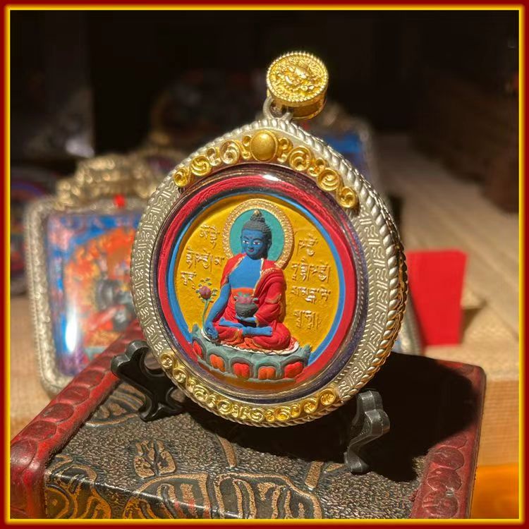 These are Buddha amulets made of clay by artisans on the roof of the world. They are fired at high temperatures and then hand-painted with mineral pigments. They are called Medicine Buddhas.