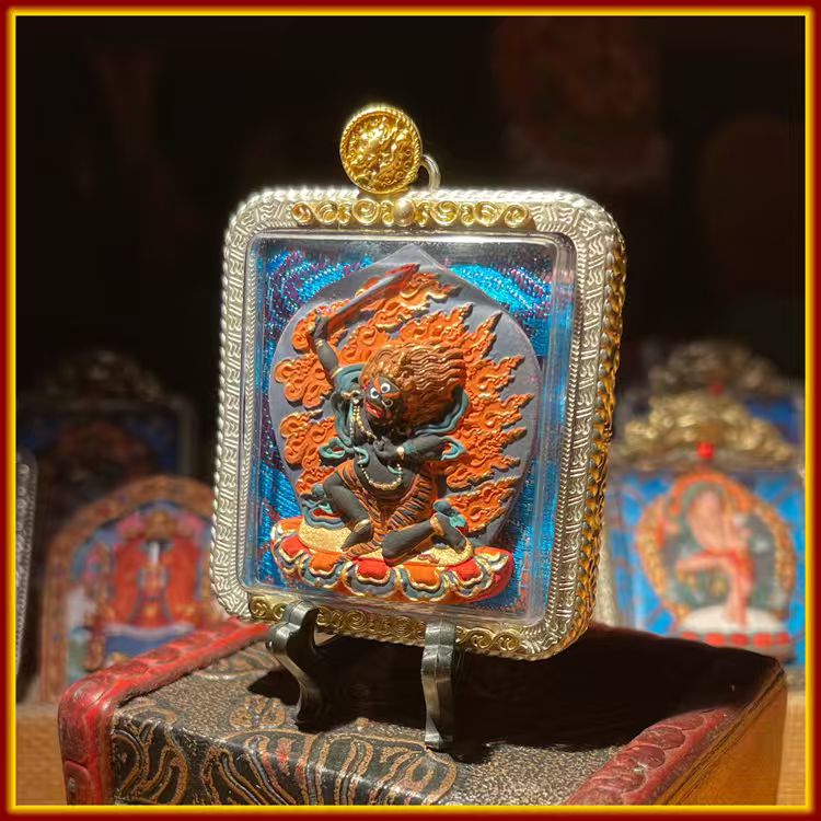 This is a Buddha amulet made of clay by artisans on the roof of the world, fired at high temperatures, and then hand-painted with mineral pigments. Its name is Acala (Fudō Myō-ō).