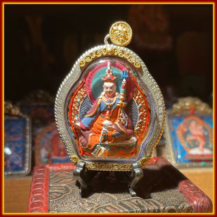 This is a Buddhist amulet made of clay by artisans on the roof of the world. It was fired at high temperatures and then hand-painted with mineral pigments. Its name is Padmasambhava.