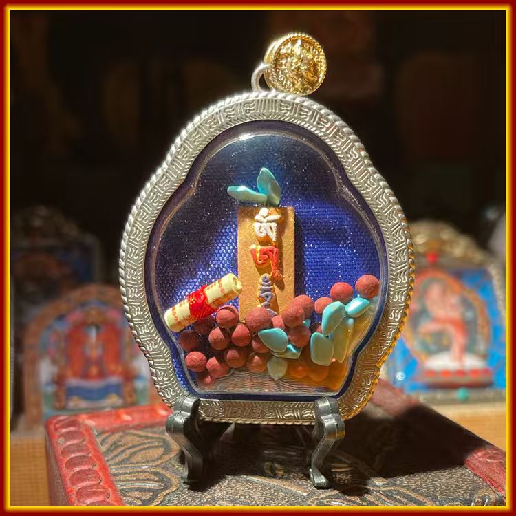 This is a Buddhist amulet made of clay by artisans on the roof of the world. It was fired at high temperatures and then hand-painted with mineral pigments. Its name is Padmasambhava.